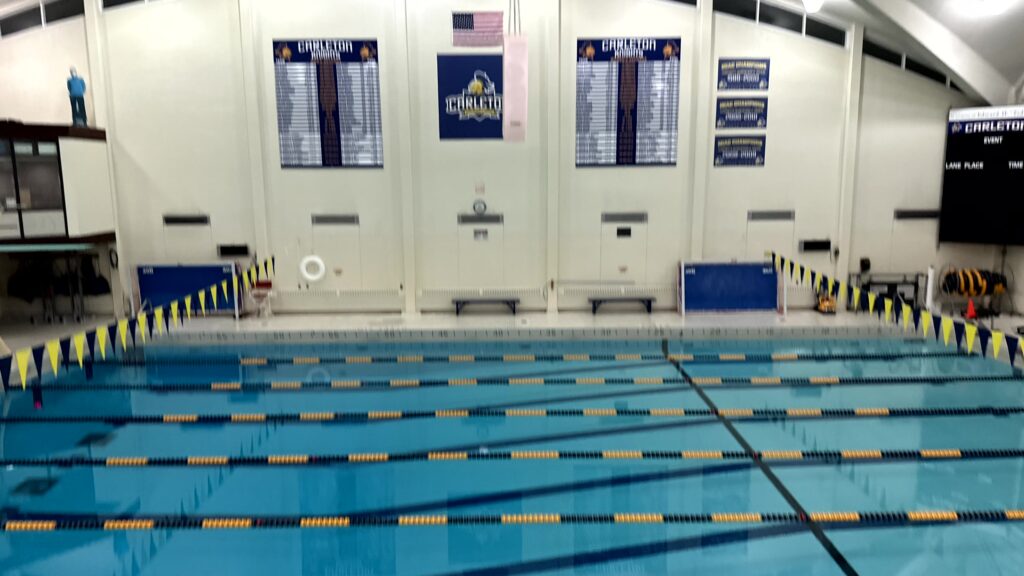 Blurry photo of pool and record boards